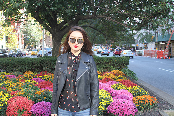 park avenue, central park, new york, nyc, fashion blogger, street fashion, junelemongirl, june lemon girl, black leather jacket, red lace up heels, red heels, kitten heels, love clutch, distressed jeans, printed chiffon blouse, v neck blouse, tie neck blouse, red lips, mirrored sunglasses, autumn fashion, autumn style