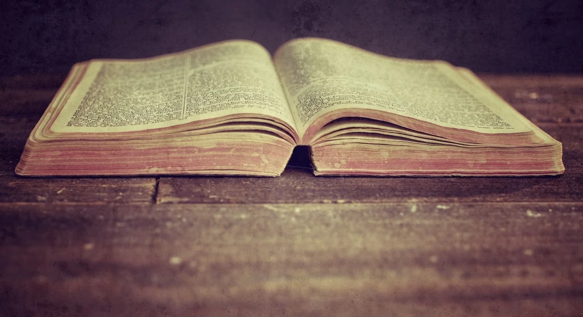 Open-Bible-Sitting-on-Table-Brightside.jpg