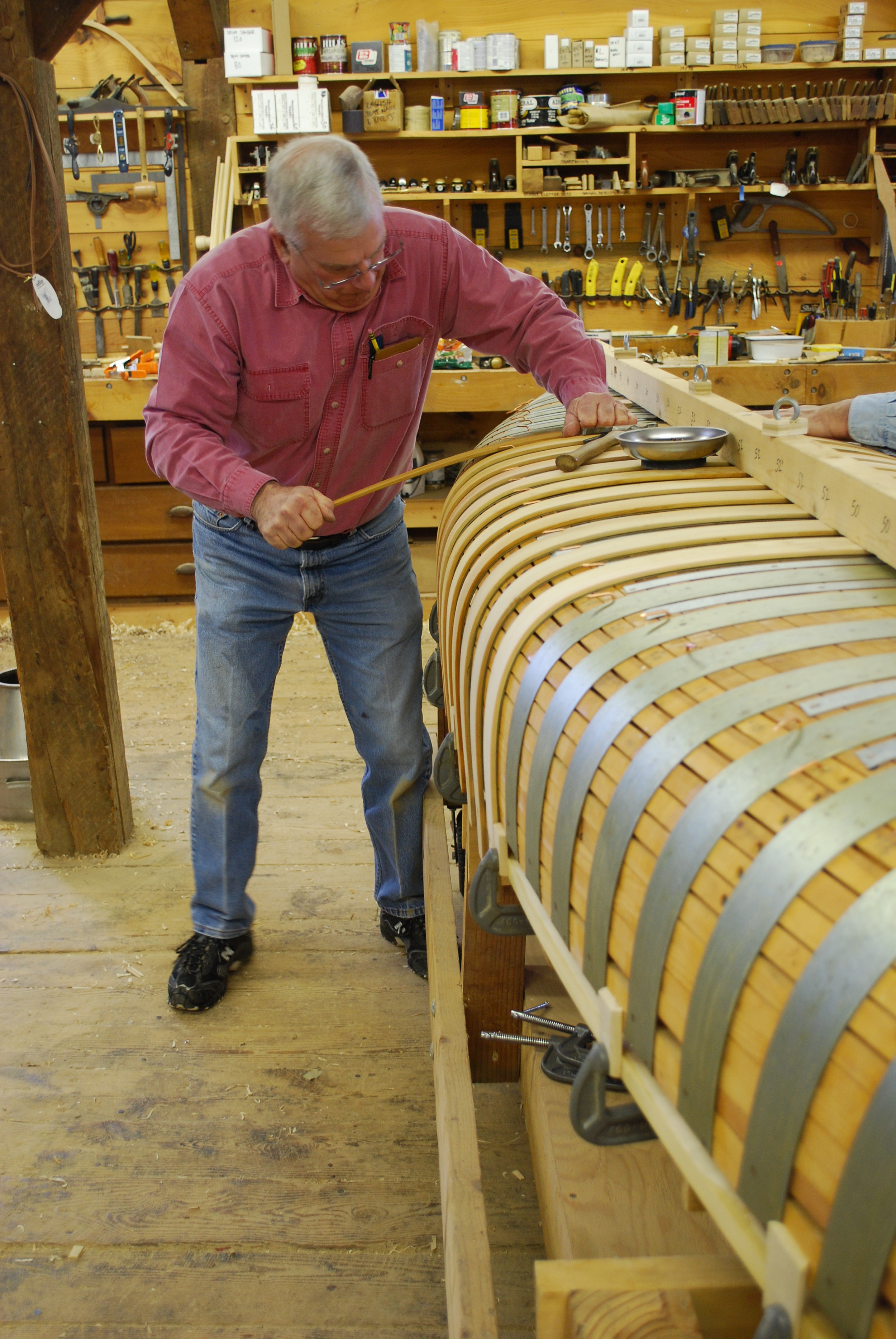 Craig stretches and bends the rib around the form