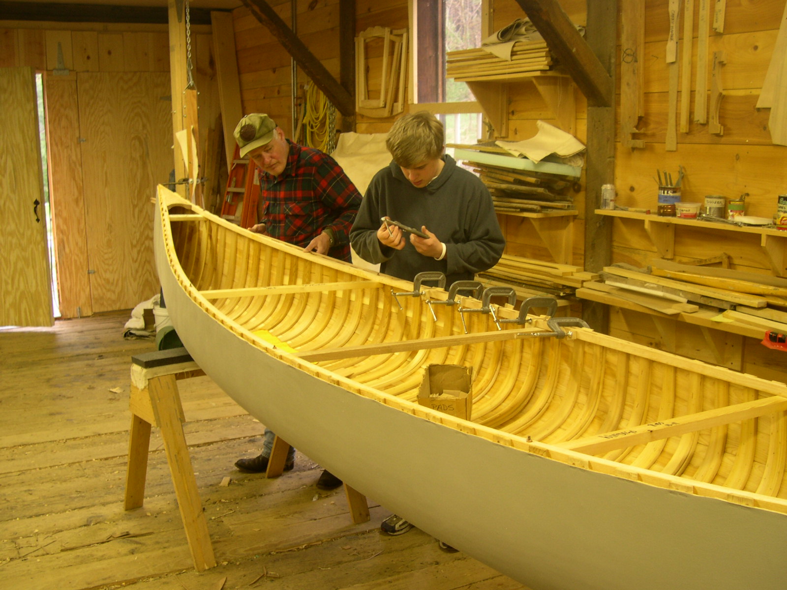 Attaching the canvas at each rib end