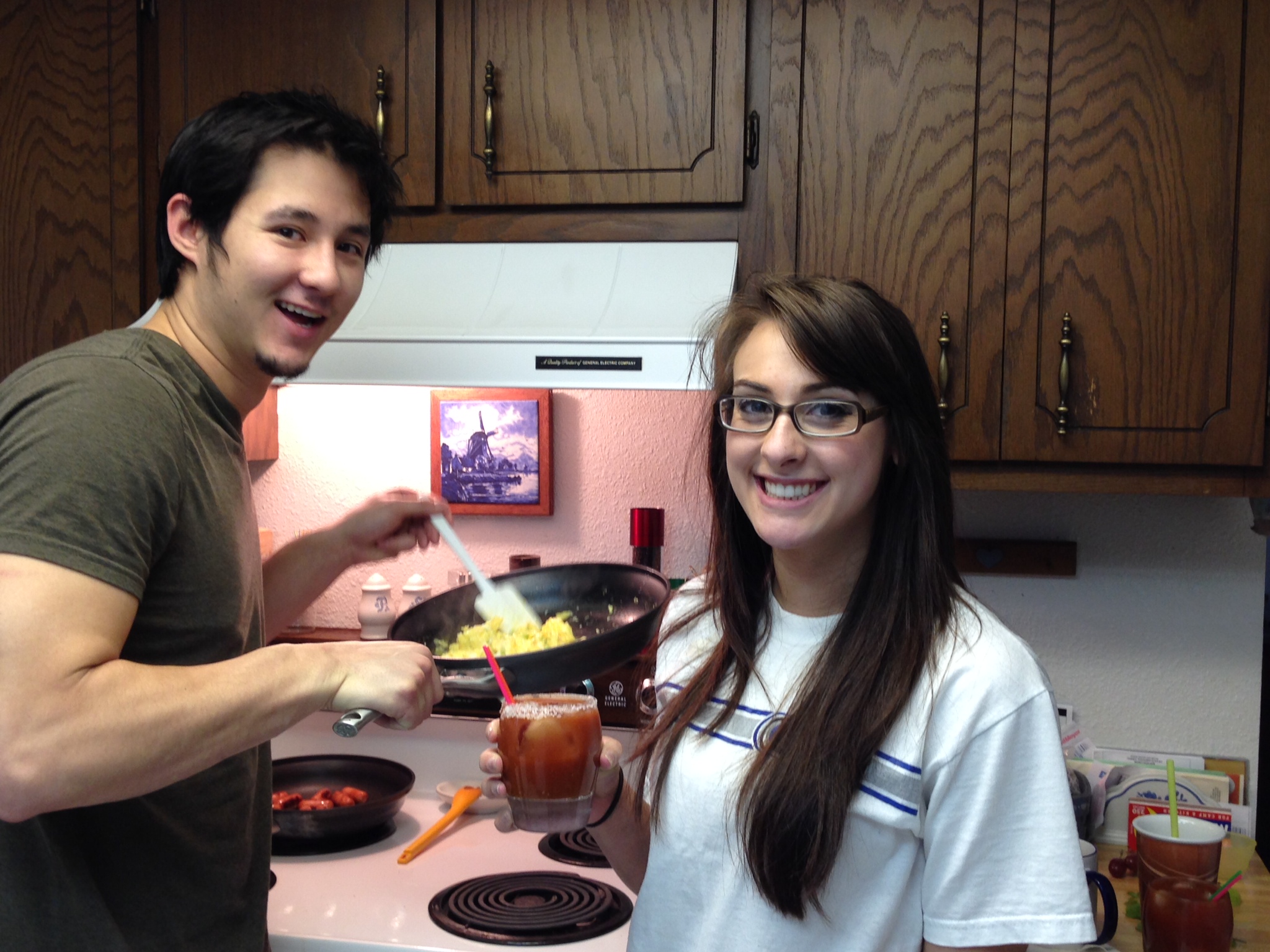 Simba&Alana cooking breakfast.JPG