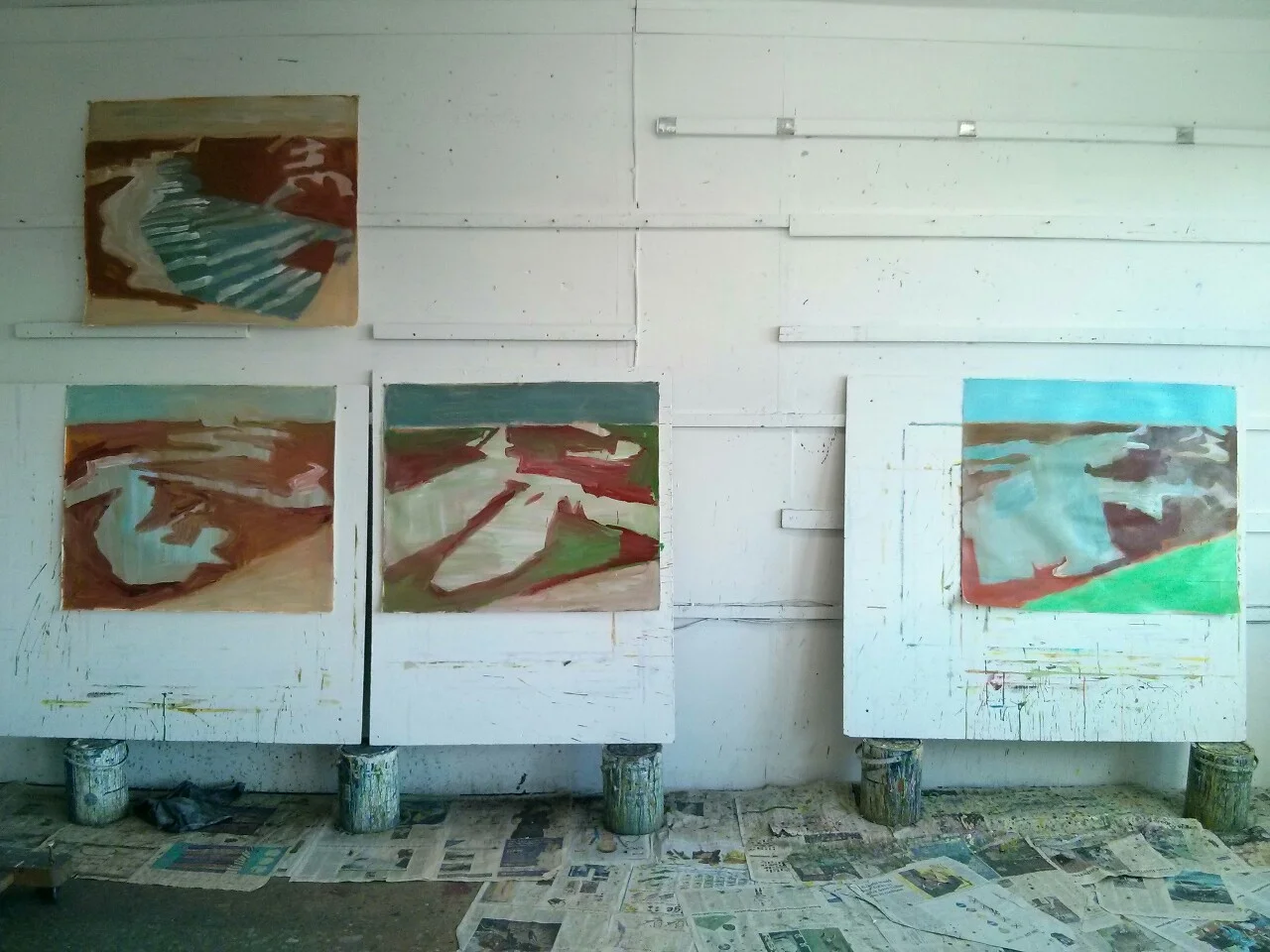 Some new paintings on paper underway. They are all based on drawings from Beaumont Cut, the centre of each containing the shape of water filled channels at high tide. This area is sandwiched between an upper zone that relates to the sky and, at the foot of the painting, a triangle that relates to the sloping bank of vegetated seawall.