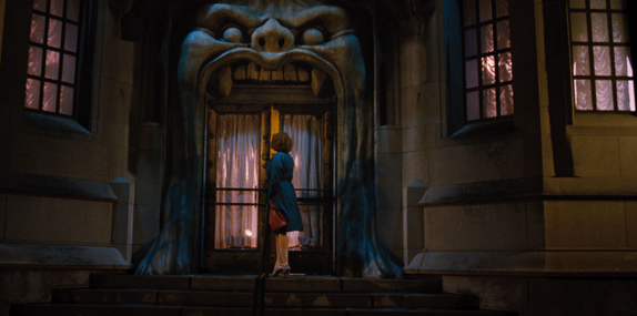 The ominous club entrance of the burlesque club where Billy takes a job