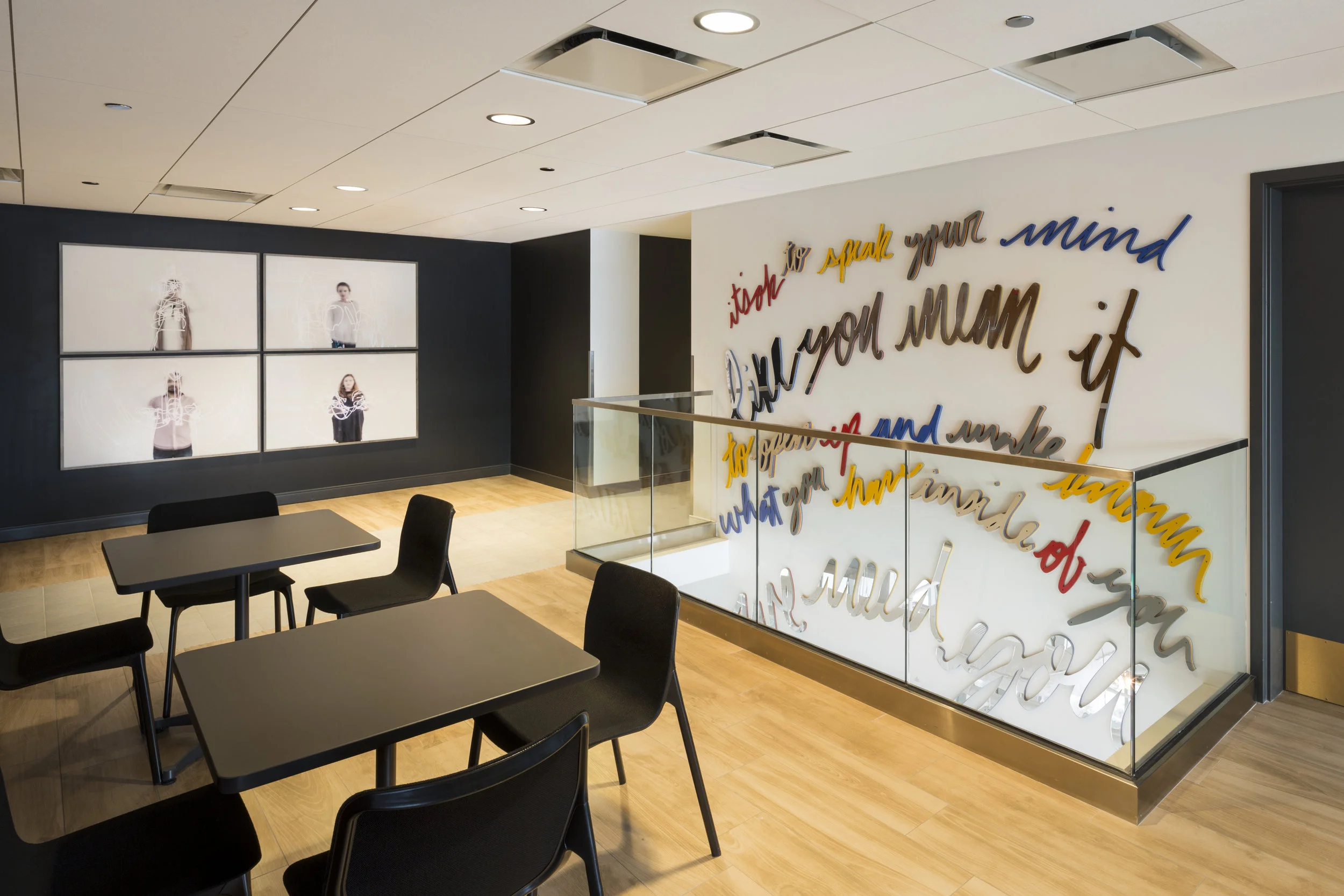 Colorful 3D word installation by Matthew Hoffman, “Spoke” lobby artwork in River West, Chicago apartment building.