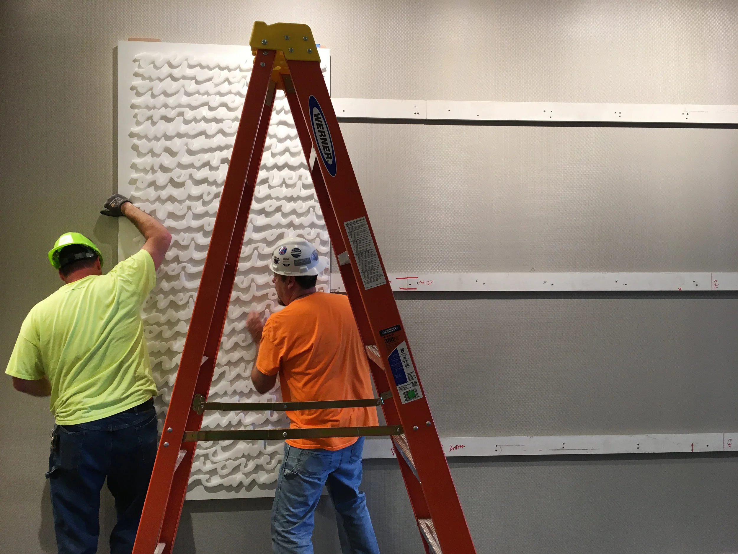 “Over & Over” large-scale white-on-white wall installation by Matthew Hoffman at Hyatt Regency McCormick Place, Chicago.