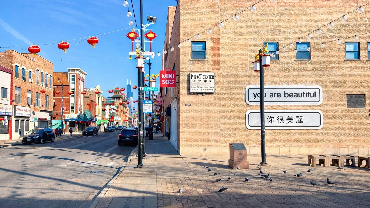 Public art, in practice.

You Are Beautiful in Chinatown, Chicago.

What I love about this piece is how it lives in the rhythm of the community &mdash; seen on routines, found in moments, part of the everyday.

These are the kinds of installations th