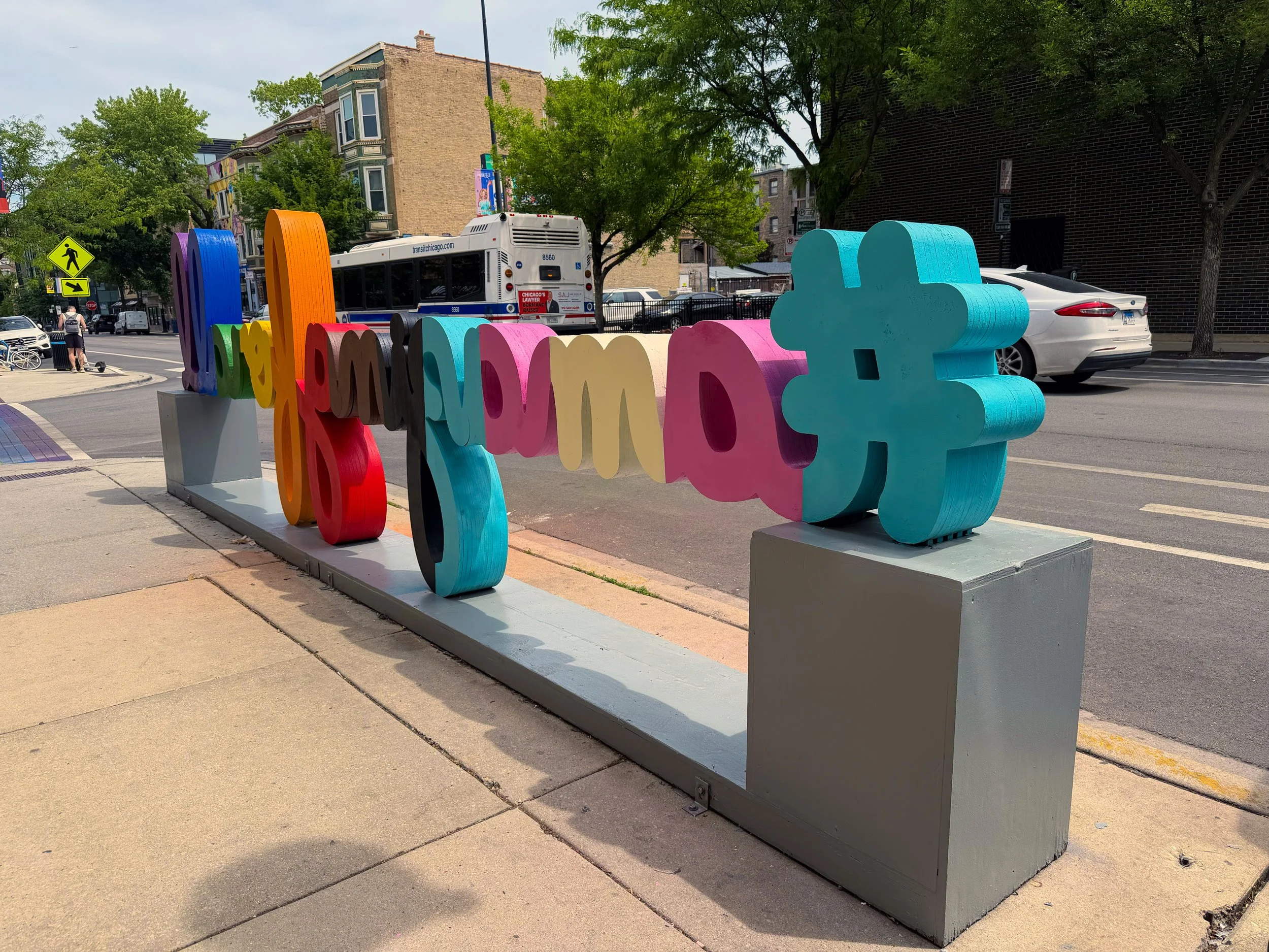 Colorful #AmazingForAll public art sculpture by Matthew Hoffman installed in Chicago’s Northalsted neighborhood.
