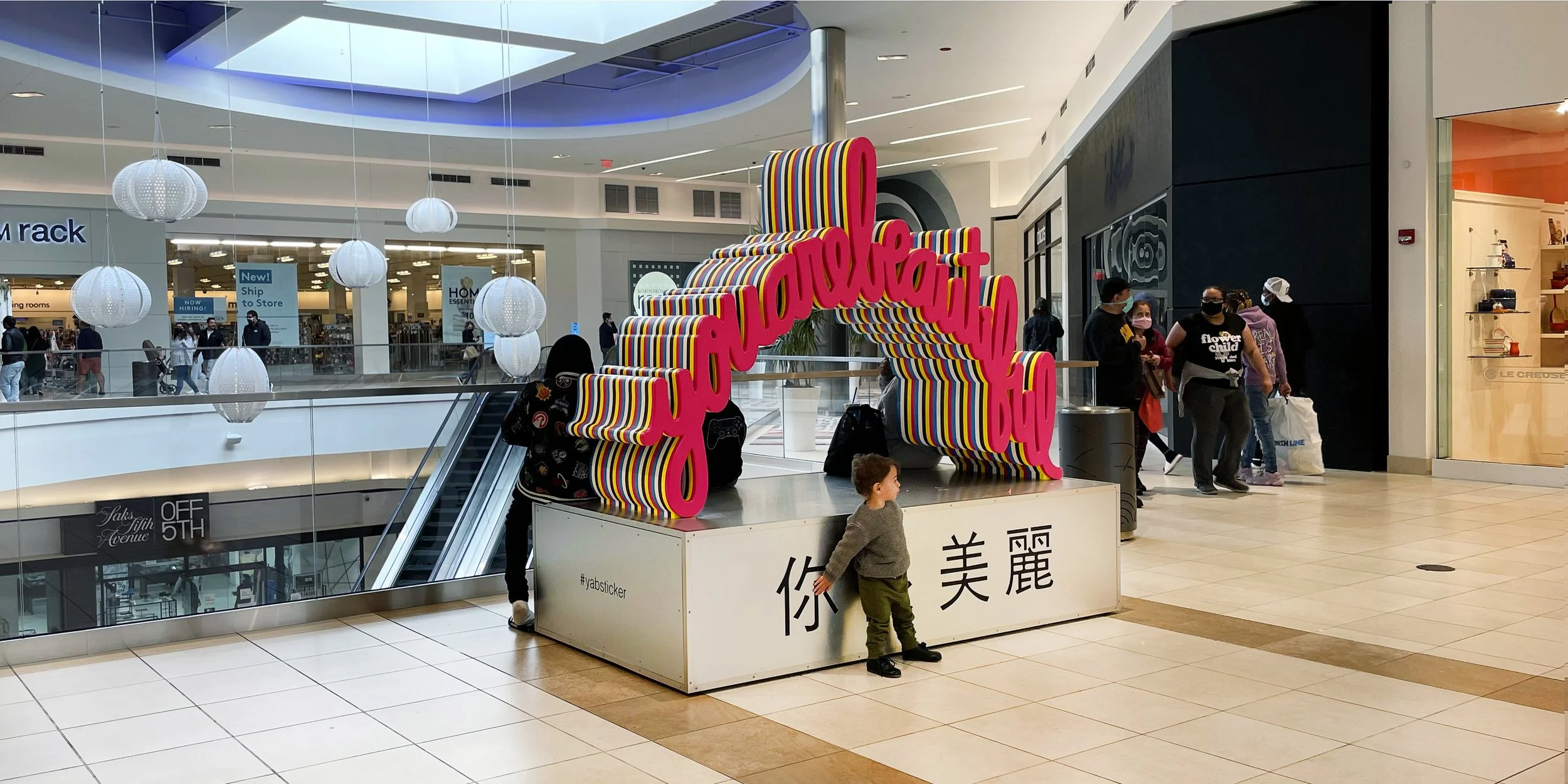 Matthew Hoffman You Are Beautiful installation Rosemont Illinois bilingual sculpture in shopping center environment