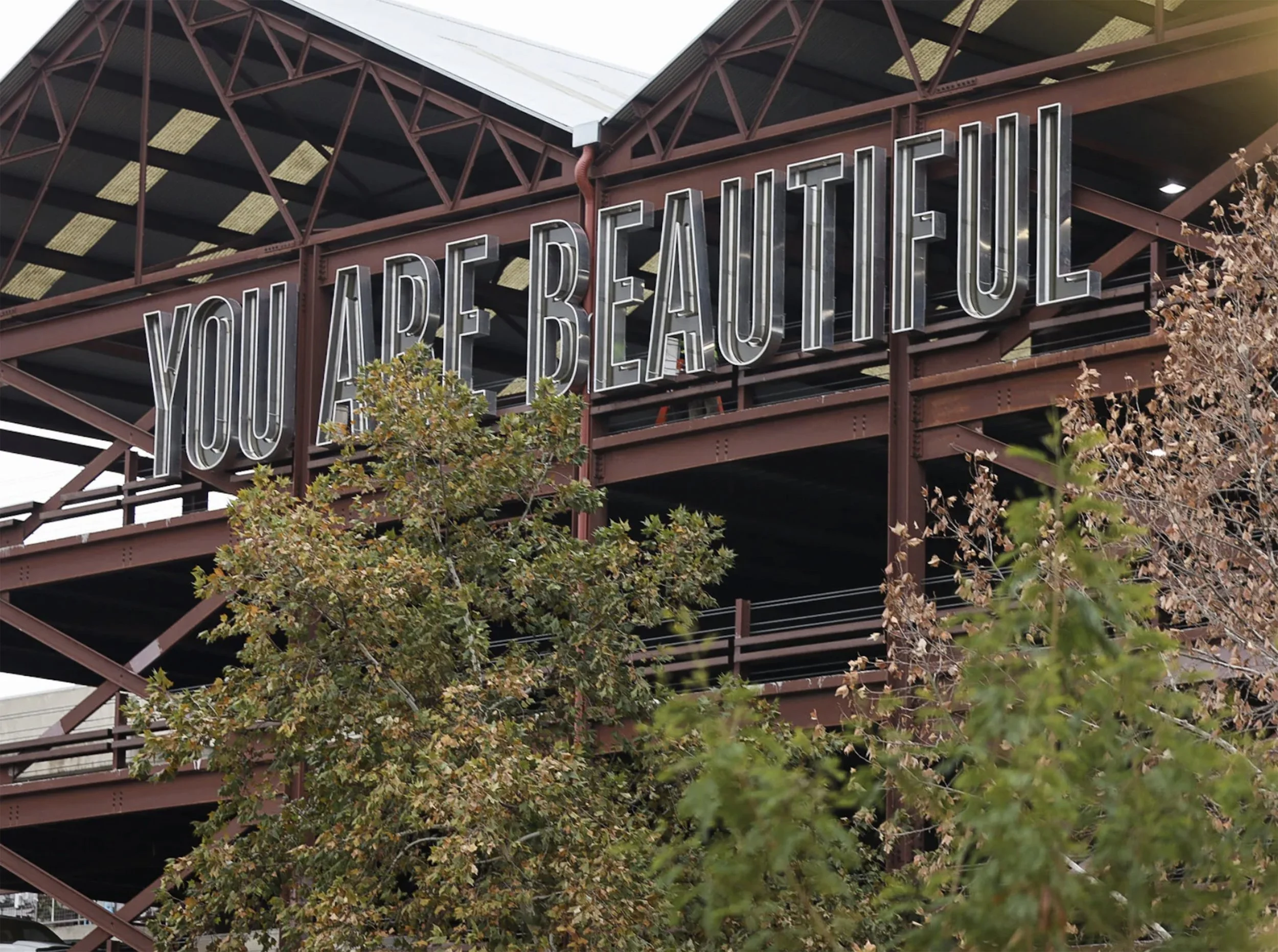 Matthew Hoffman You Are Beautiful installation visible from Interstate 35 in downtown San Antonio Texas