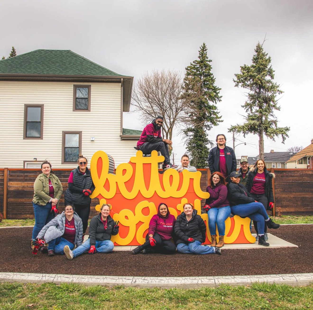 Community members interacting with Matthew Hoffman’s sculpture, an uplifting example of placemaking and the power of public art.