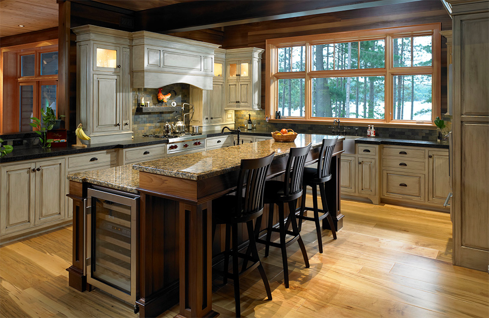   Built entirely of sustainable materials, finished in soft contrasting hues, the light washed traditionally styled cabinets clearly suggest that great things happen here… if the cooks can take their eyes of the view.     