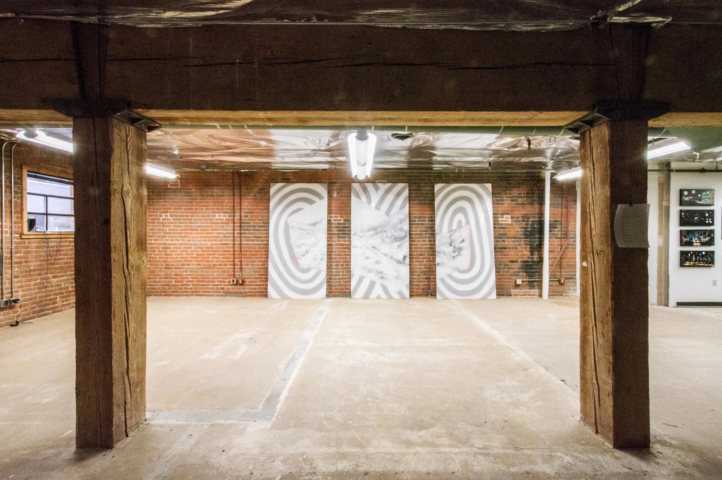 2014 Artist in Residence Space in BoDo. Aerosol on wood panels, work in progress by Tony Caprai. Photo by: Ken Bayen