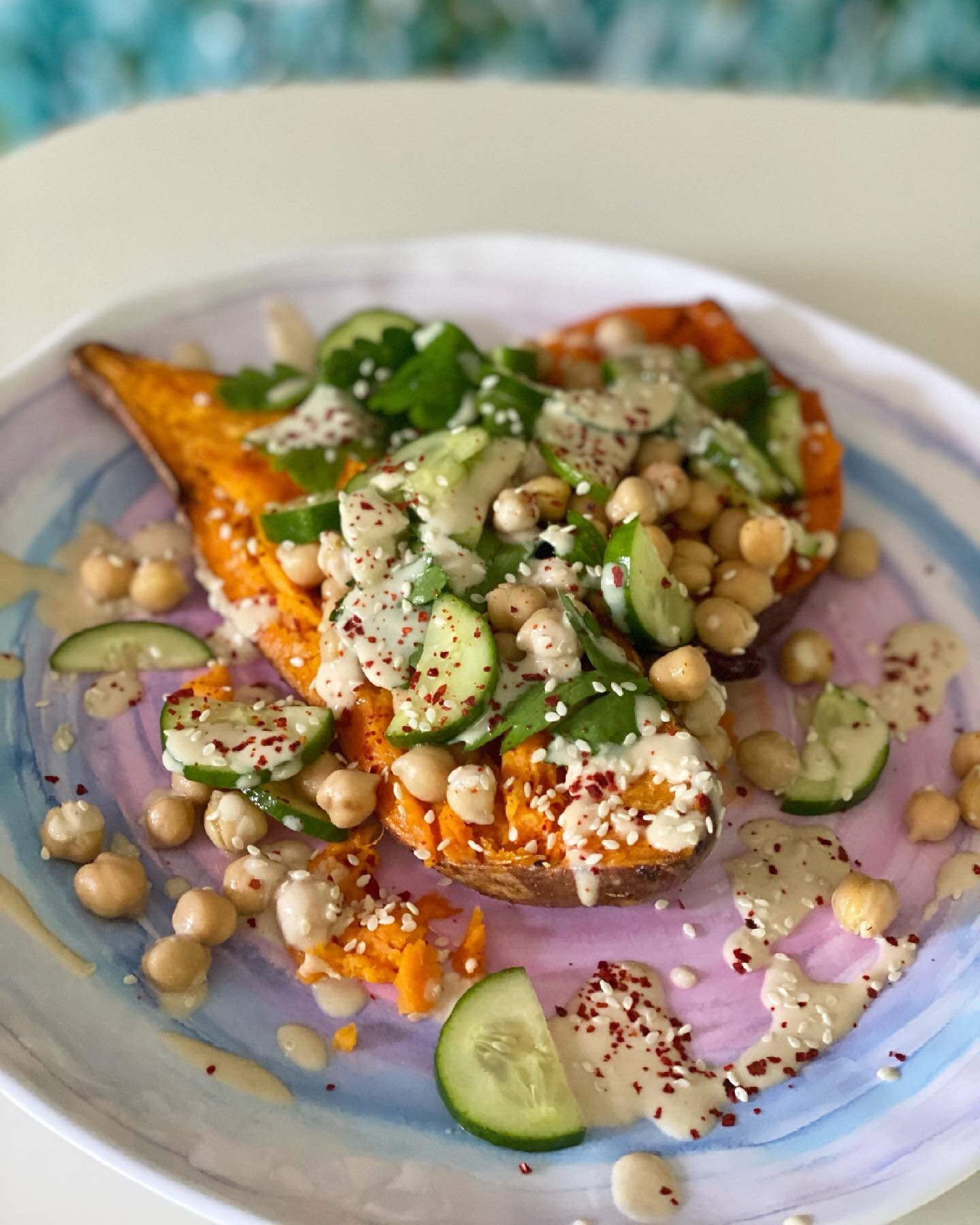 There&rsquo;s a little extra spring in my step &amp; on my plate these days 🌱

Loved this Stuffed Sweet Potato
with Cucumber Chickpea Salad &amp; Miso Tahini recipe from @purplecarrotxo 💜

What do you enjoy most about the longer days &amp; warmer w