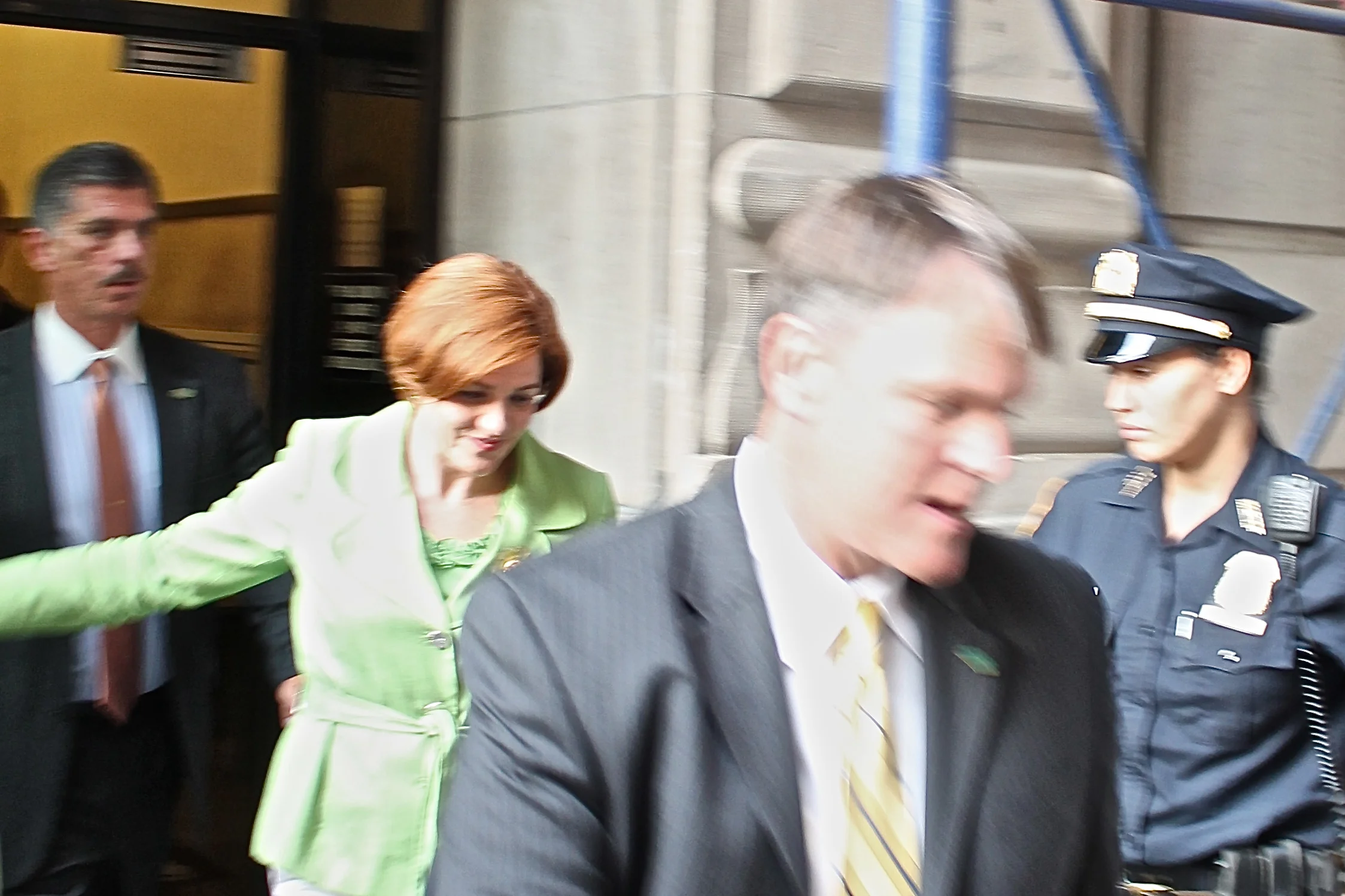Former New York City Council Speaker Christine Quinn , second from left, exits a fundraiser for her failed 2013 mayoral campaign. For years, former Speaker Quinn was birddogged by protesters for her record of corruption. After the humiliating loss of her mayoral campaign, the former Council speaker chose to make a political comeback by being the public face of Gov. Andrew Cuomo's sham Women's Equality Party . Source : Louis Flores
