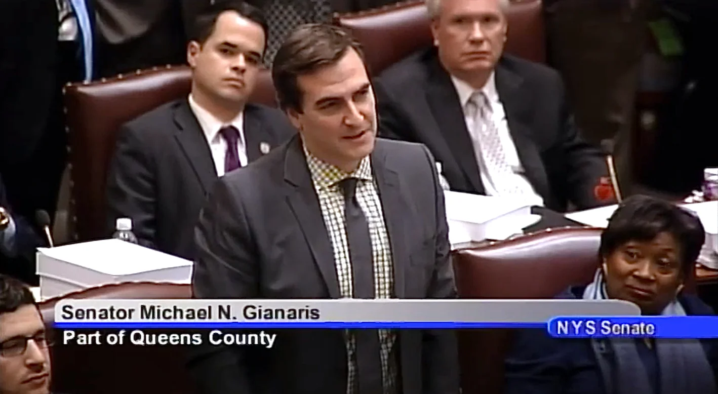 New York State Senator Michael Gianaris (D-Queens) heads the New York Democratic Senate Campaign Committee, which required candidates to use a campaign vendor, The Parkside Group. Seen here during remarks made on the floor of the State Senate on March 31, 2014, Senator Gianaris made comments in support of the compromise ethics reforms adopted as a result of the premature closure of the Moreland Commission . Source : New York State Senate/YouTube Screen Shot