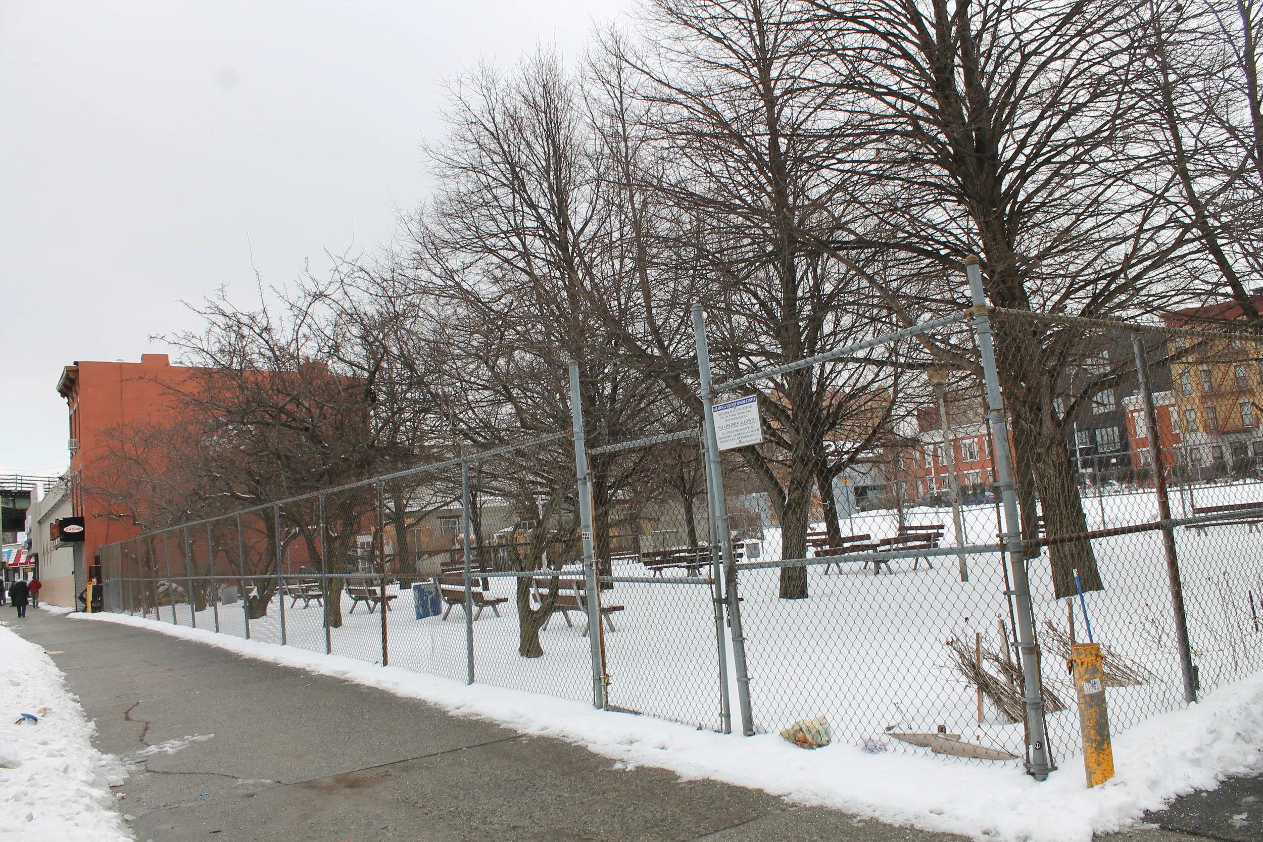 A sitting park in the Saratoga Square Section 8 housing development in Brooklyn, which NYCHA sold to a consortium of developers. Photographed here in March 2015, this open space can be taken away from residents and exploited for new construction by the consortium of developers, according to the transactions agreements approved by the de Blasio administration. Source : Louis Flores
