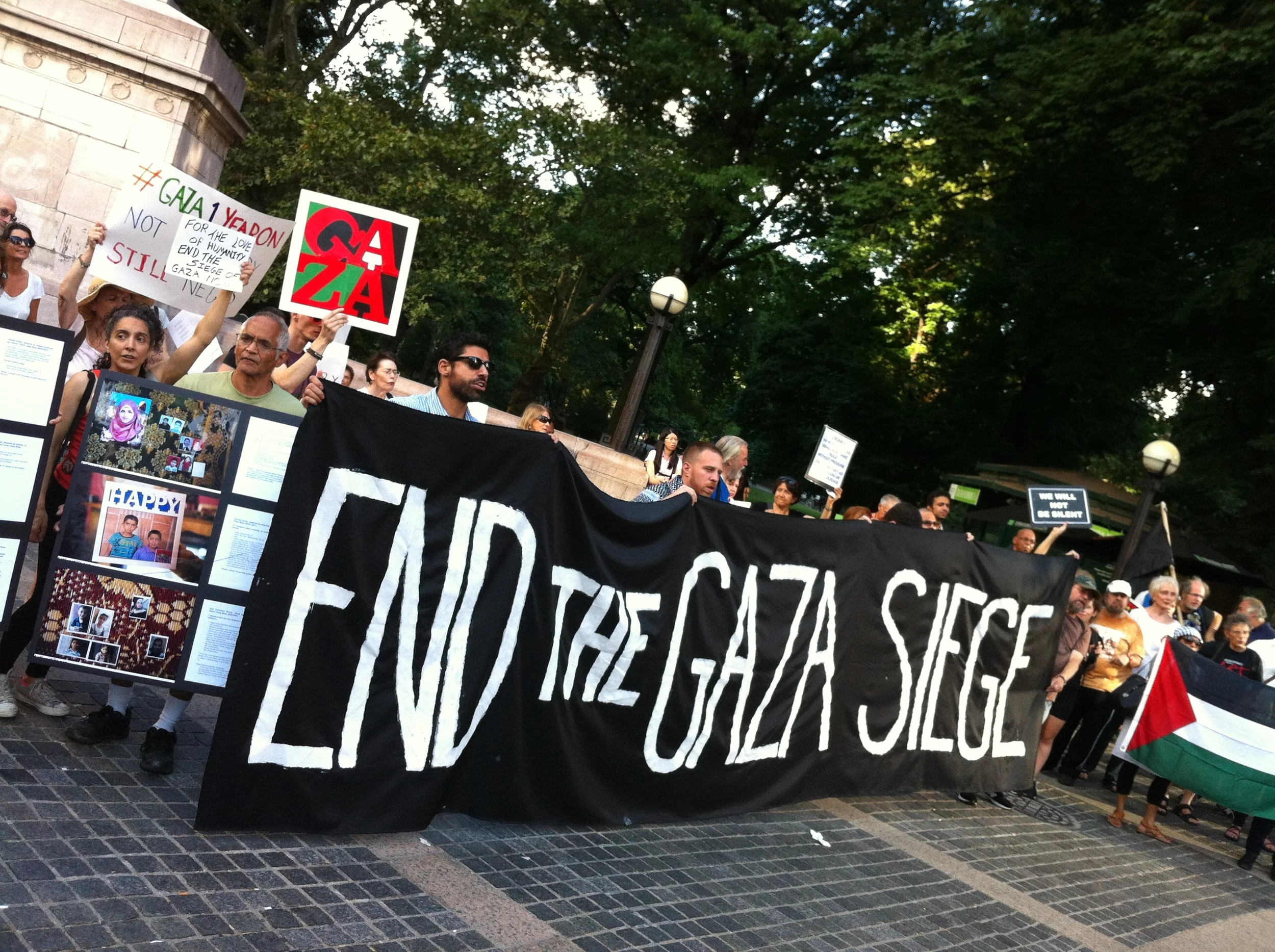 Members of a coälition of human rights groups, including the New York City chapter of Jewish Voice for Peace , demonstrated on August 26, 2015. Over 100 human rights activists marched from the American Museum of Natural History on the Upper West Side of Manhattan to Columbus Circle, seen here, to call for an end to the violence by the state of Israel against the Palestinians . Source : Louis Flores/File Photograph