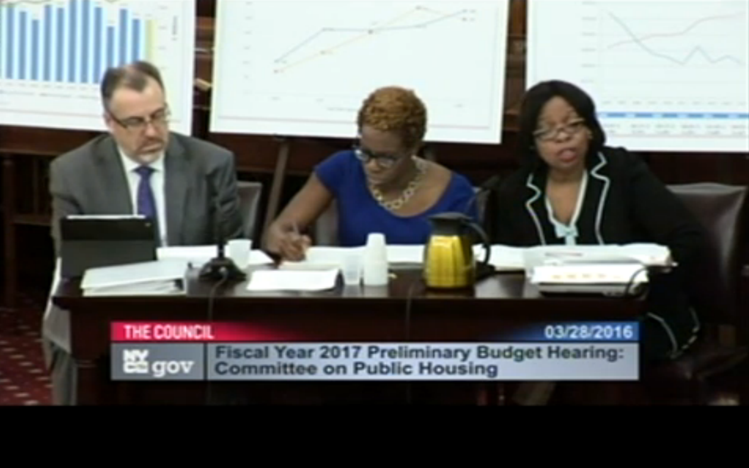 Left to right : Brian Clarke, senior vice president for operations ; Shola Olatoye, chief executive officer ; and Karen Caldwell, executive vice president and chief financial officer for the New York City Housing Authority, testifying at Monday's hearing. Source : Video Feed from New York City Council/Public Domain