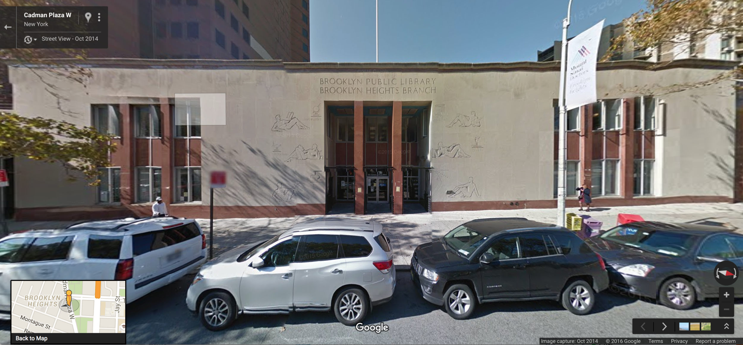 The Brooklyn Heights library branch of the Brooklyn Public Library, as seen in October 2014. The library branch faces Cadman Plaza Park, and across the quiet park are situated two Federal office buildings housing each of the U.S. District Court House and the U.S. Attorney's Office, each for New York's eastern district. Source : Google Street View