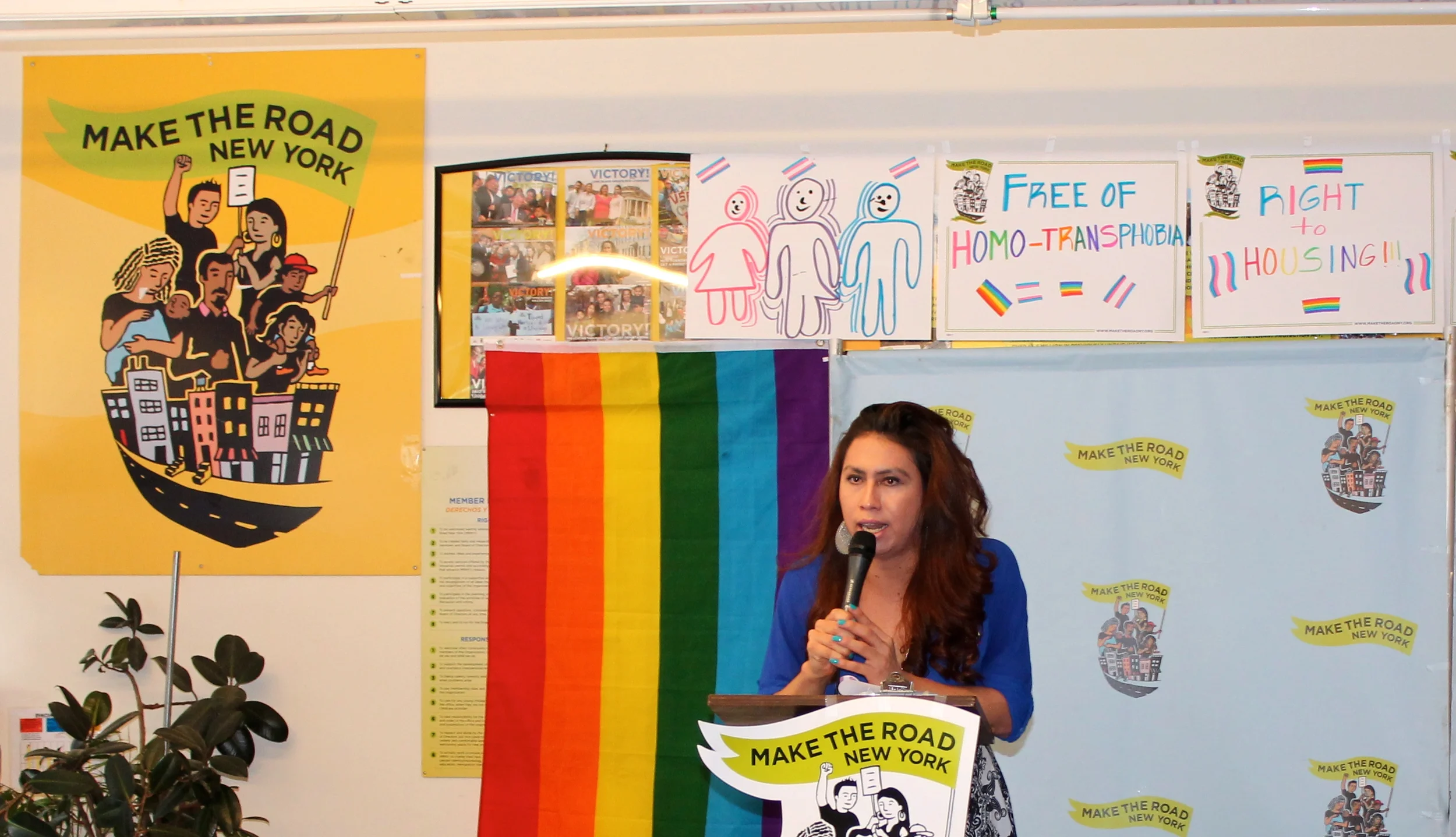 Bianey Garcia , the Pryde-LGBTQ organiser for Make the Road New York , delivered introductory remarks in Spanish during the press conference on Monday in Jackson Heights, Queens. Source : Louis Flores/Progress Queens
