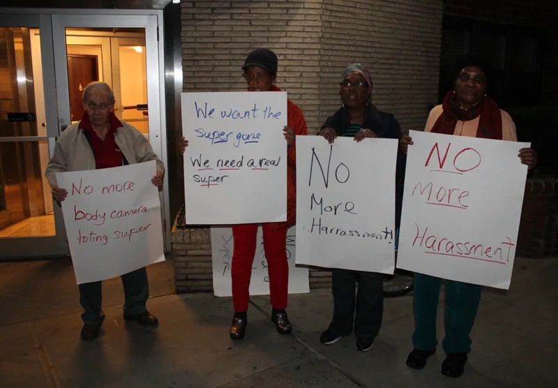 Some of the protesters, who demonstrated outside of 60 Turner Place in Brooklyn on Saturday evening, demanding better living conditions and the firing of the apartment building's superintendent, Herchin Ablai . Source : Louis Flores/Progress Queens