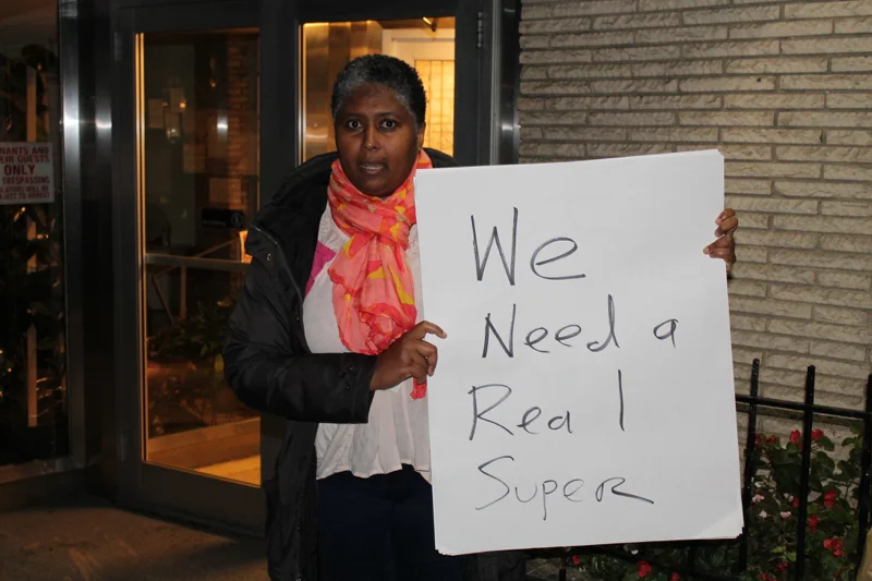Reina Seedarnee , a tenant of 12 years at 60 Turner Place, said that the landlord has at times stopped cashing her rent checks in order to deliberately sue her for nonpayment of rent. Ms. Seedarnee is a tenant organizer in the apartment building managed by ADI Management . Under the Fair Housing Act , landlords are prohibited from retaliating against tenants, who provide assistance to others in exercising their tenants' rights. Source : Louis Flores/Progress Queens.