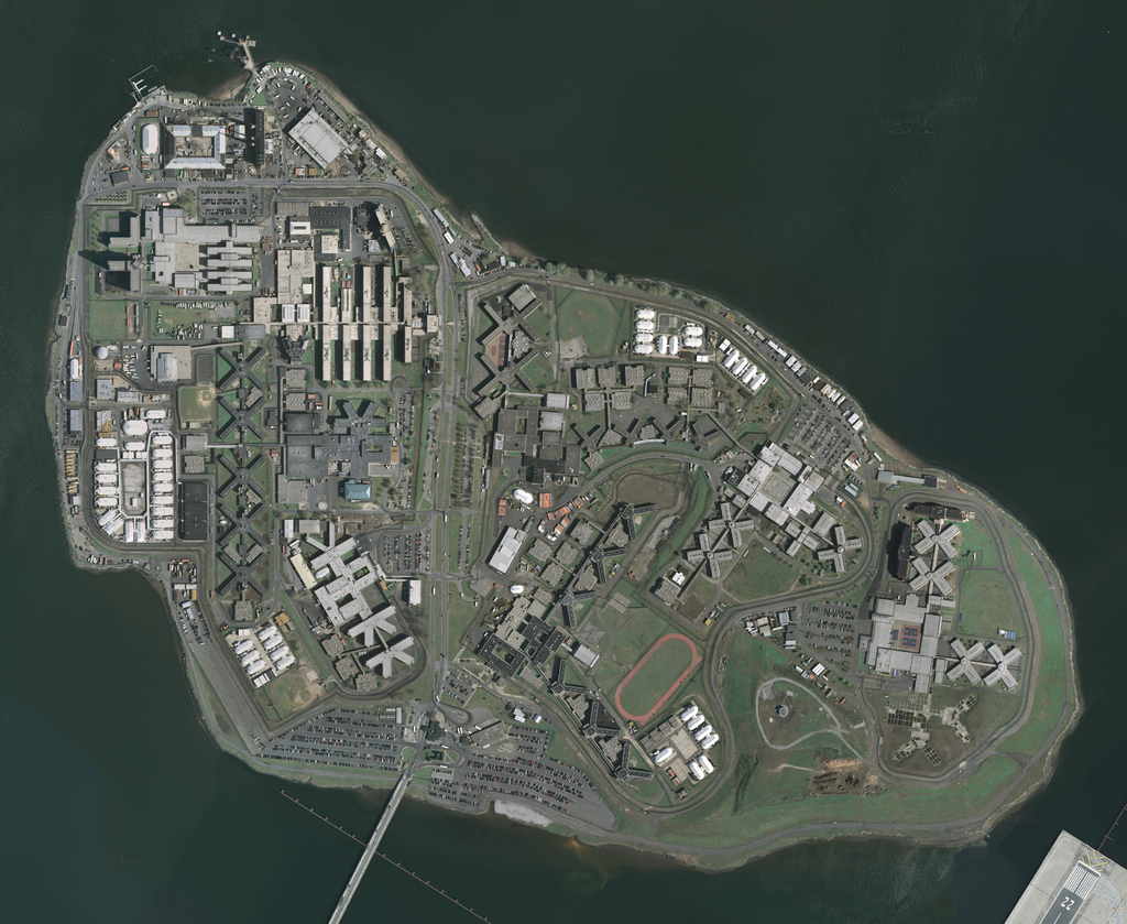 Rikers Island is located north of La Guardia Airport in Queens. Inmates continue to complain that they perceive conditions to be violent at the Municipal jail complex. Source : U.S. Geological Survey/Public Domain