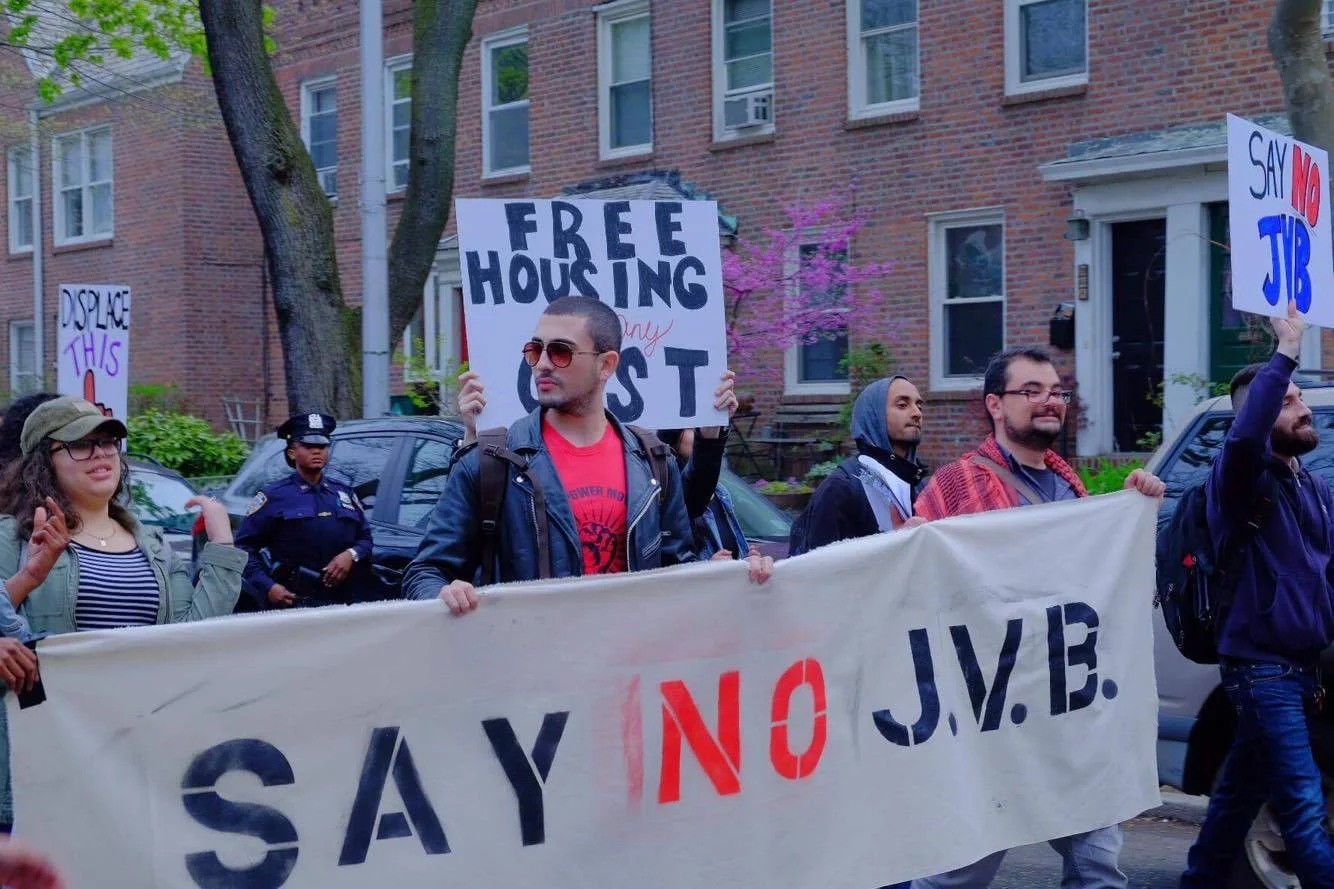 The protest and march through Sunnyside, Queens, was organised by the group, the Queens Anti-Gentrification Project . The formation of the group and the rise of anti-gentrification protests in Queens is a reflection of growing citizen displeasure with elected officials, who offer Government support to real estate projects or policies, which, in turn, creates critical social and economic problems for citizens. Source : Queens Anti-Gentrification Project/Used With Permission