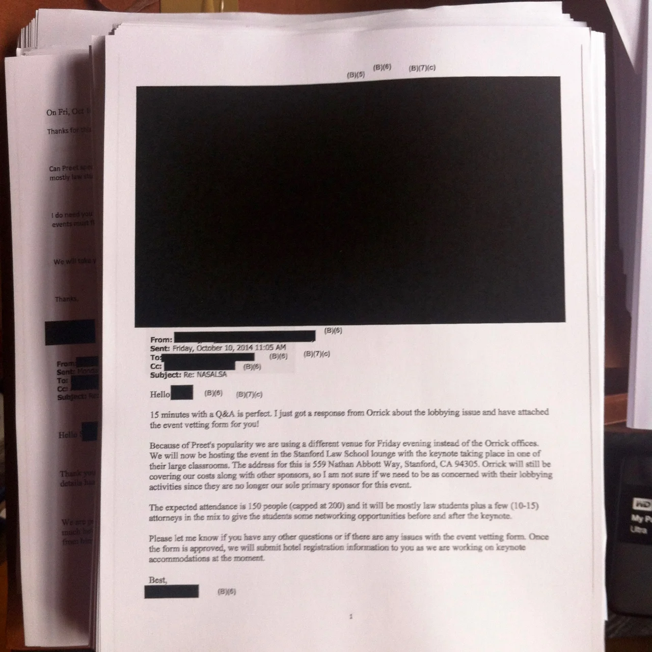 Upon initial review of the hardcopy production of documents, the identities of every sender and receiver were redacted in e-mail discussions about the speaking arrangements for former U.S. Attorney Preet Bharara , and large sections of some e-mails were entirely redacted. Source : Louis Flores/Progress Queens