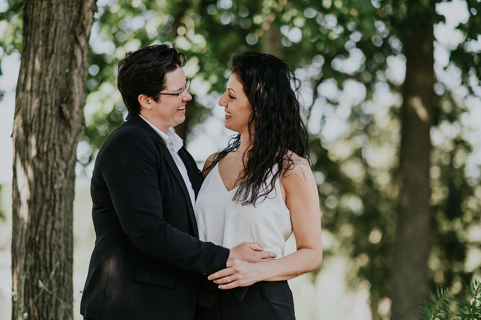 MKE Bride and brides Married in Milwaukee at Beggs Isle in Oconomowoc outdoor backyard wedding lgbtq love is love_1288.jpg