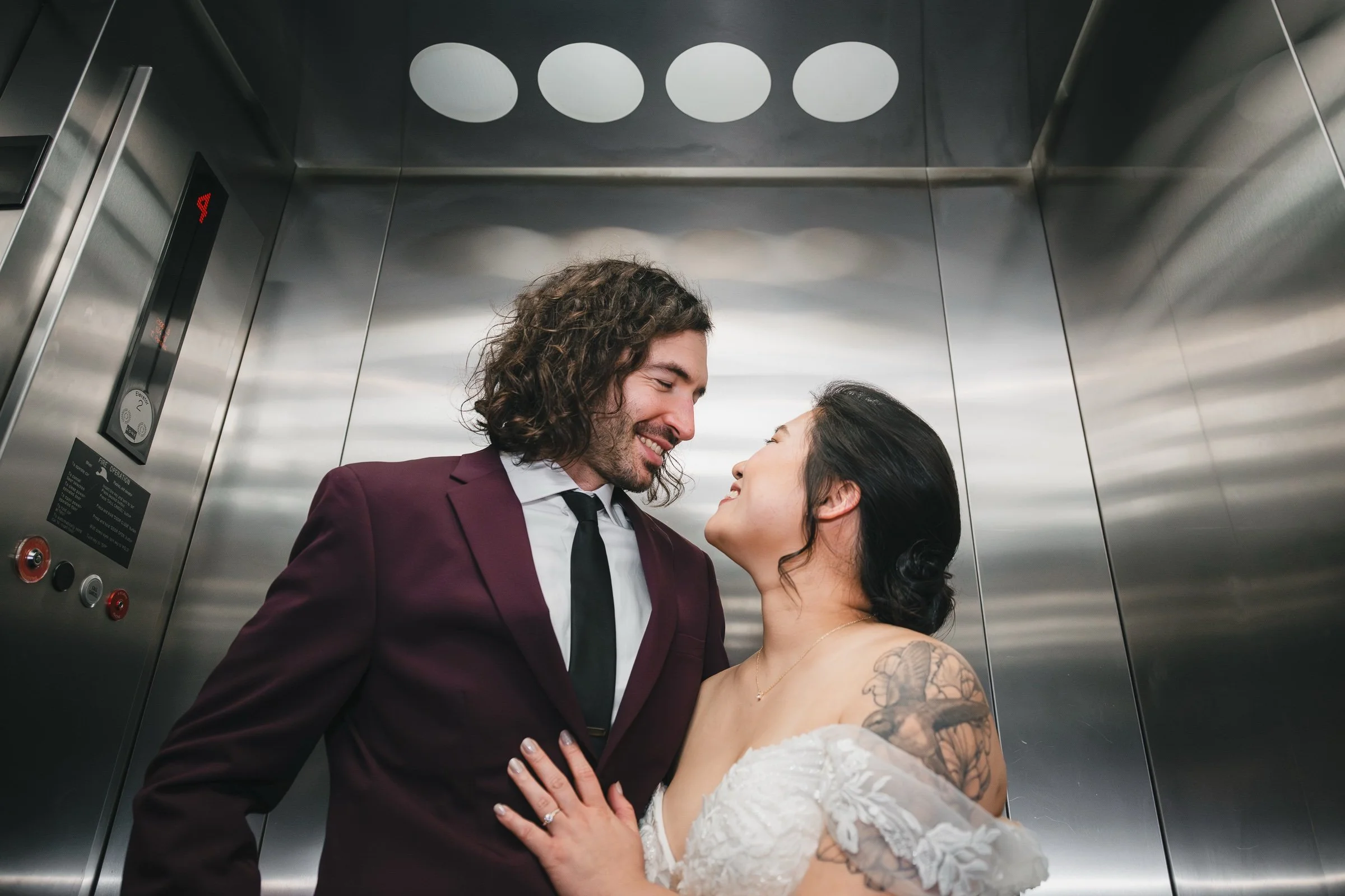 16.bride and groom first look at Iron Horse Hotel Milwaukee-walkers-point-wedding.jpg