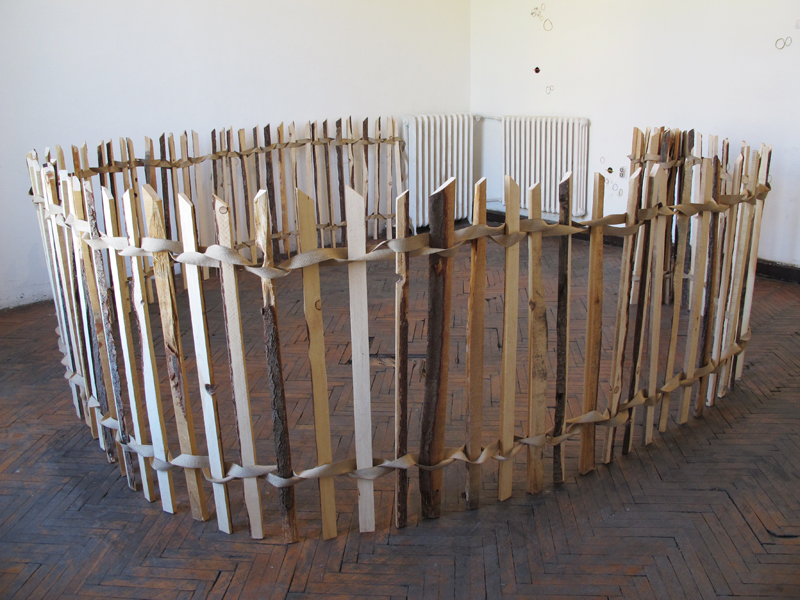 FENCED OFF AREA  (2012) Reclaimed wood, canvas webbing, staples Installation view: The 53rd October Salon, Belgrade, Serbia