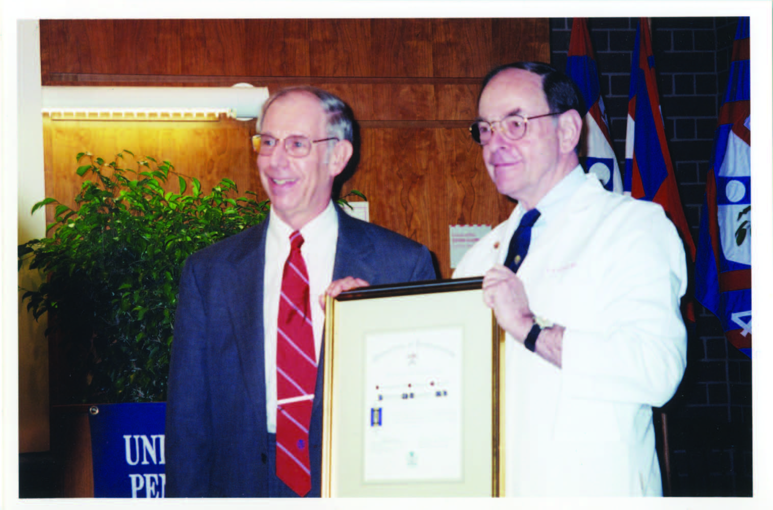Dr. Albert receiving the Distinguished Alumni Award in 2001.