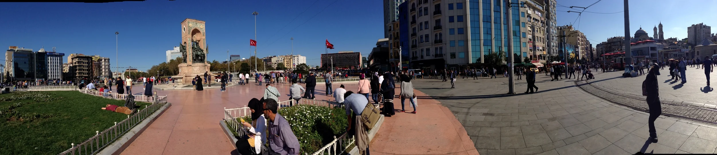 Taksim Square; which is actually round with not one but 2 huge Turkish flags flying.