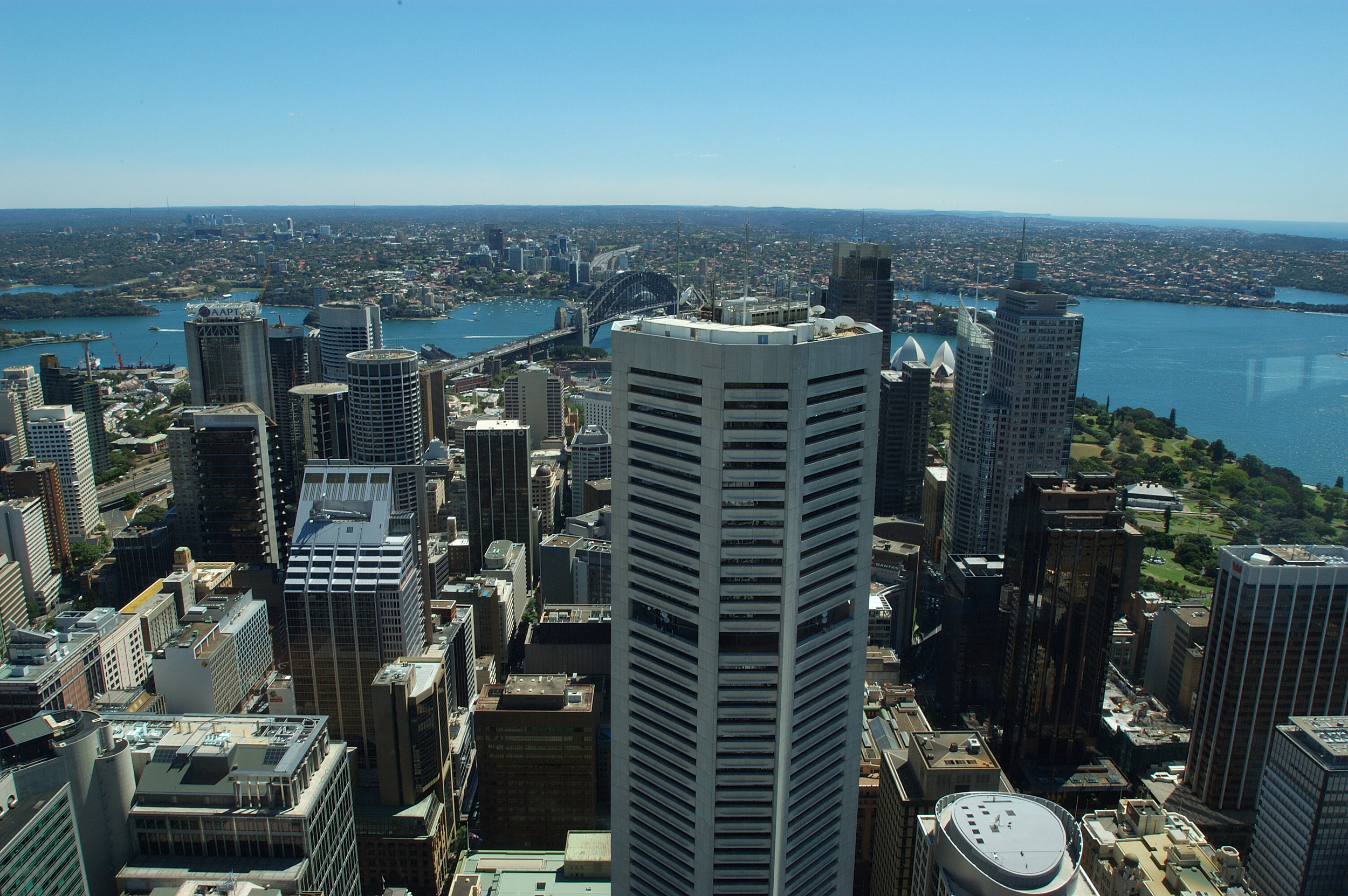 View to Harbour Bridge with a peek a boo Opera House between buildings
