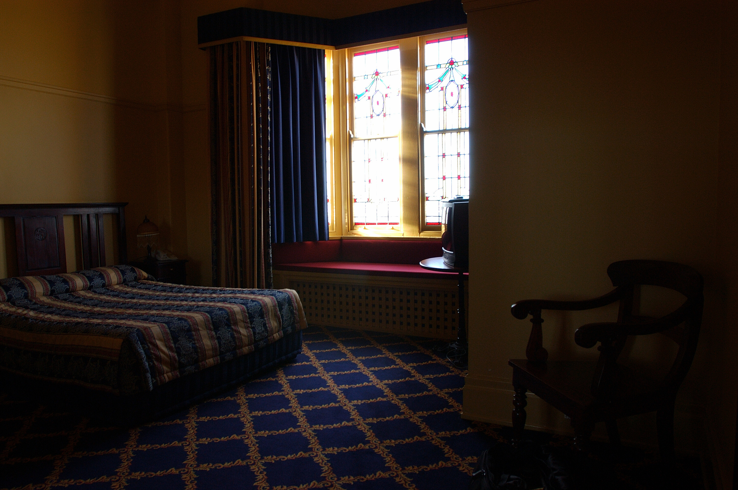 Our room at the Carrington, with stain glass windows.