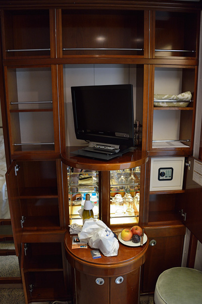 Lots more storage, a safe, tv and minibar