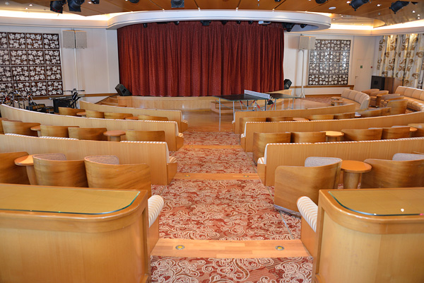 The stage and seating areas in Le Grande Salon. This is the main area for entertainment, including it appears, ping pong!