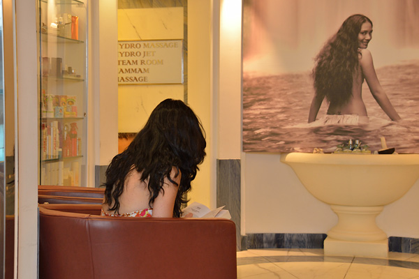 Spa, and everyone asks but it was pure luck that the passenger waiting for service looks just like the poster!