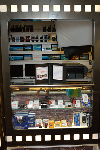 A little closet for the on board photographer. Photos would be lined on the walls, but he sold any necessities and photos from this tiny kiosk during dinner hours