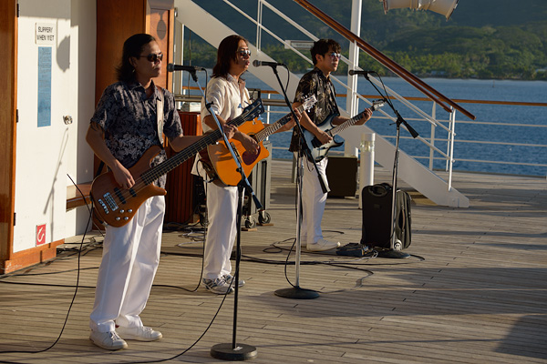 The band performing on the pool deck