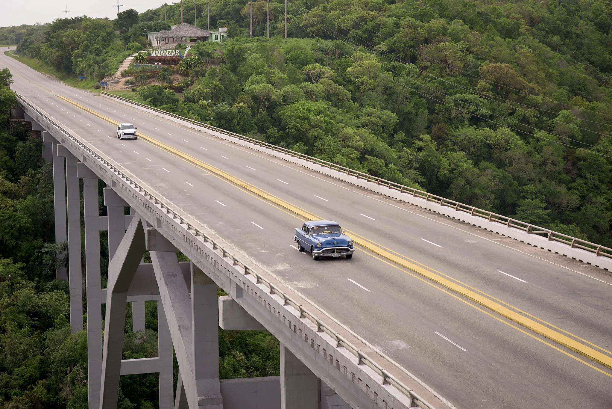 The main road out from Havana to Matanzas features a huge 4 lane bridge, the Bacunaygaua Bridge spanning the Yumuri River. Despite this being the main east/west route into Havana, Jeff found he had to be patient to photograph it with a vehicle on the span. 