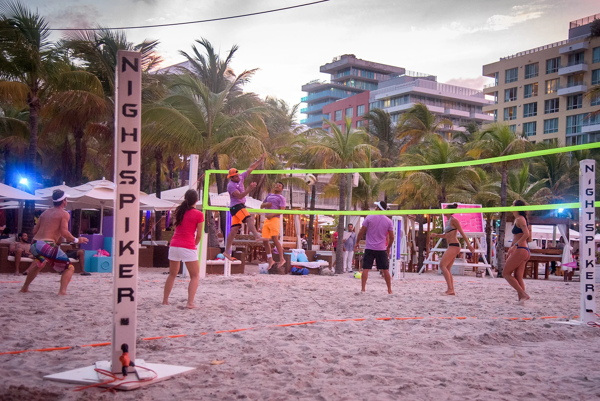 Sunday night beach volleyball at courts by South Beach amped up with lights and music and a bar! 