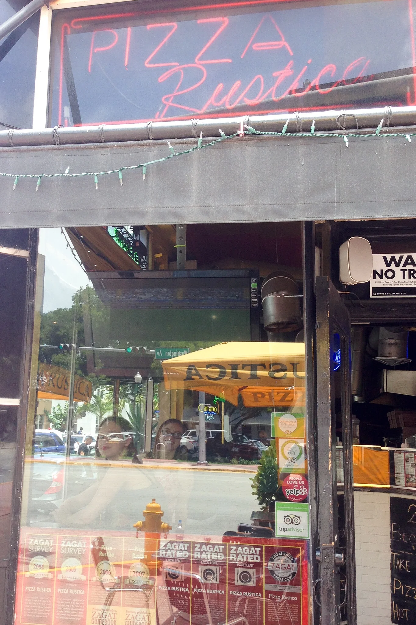 Pizza Rustica is a just a store front with a broiling hot pizza oven and a counter top inside or some umbrella tables outside, but the pizza is deliciouso!