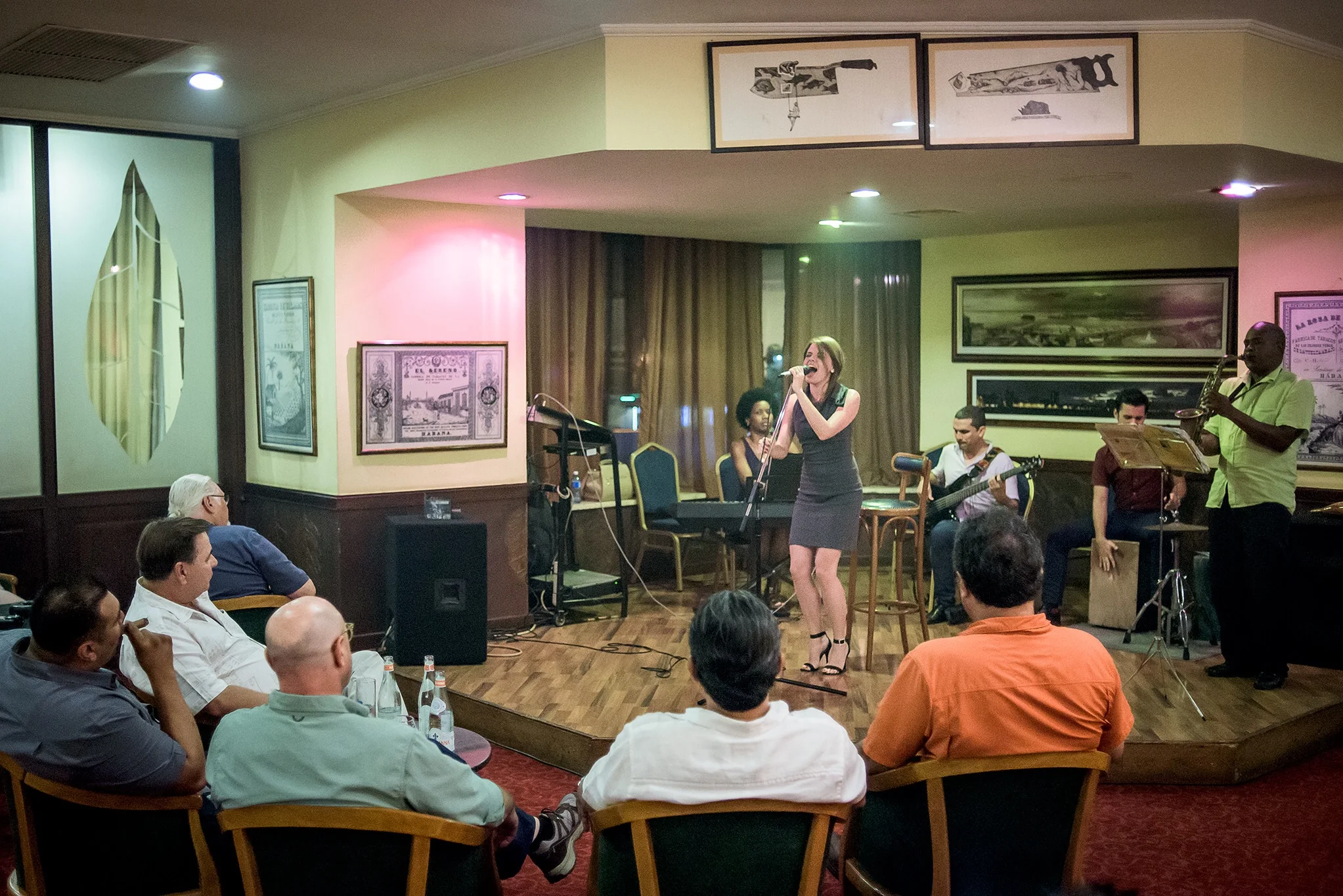 This smoke filled cigar bar exacerbated my cough, even though the jazz band was well worth the trouble! 