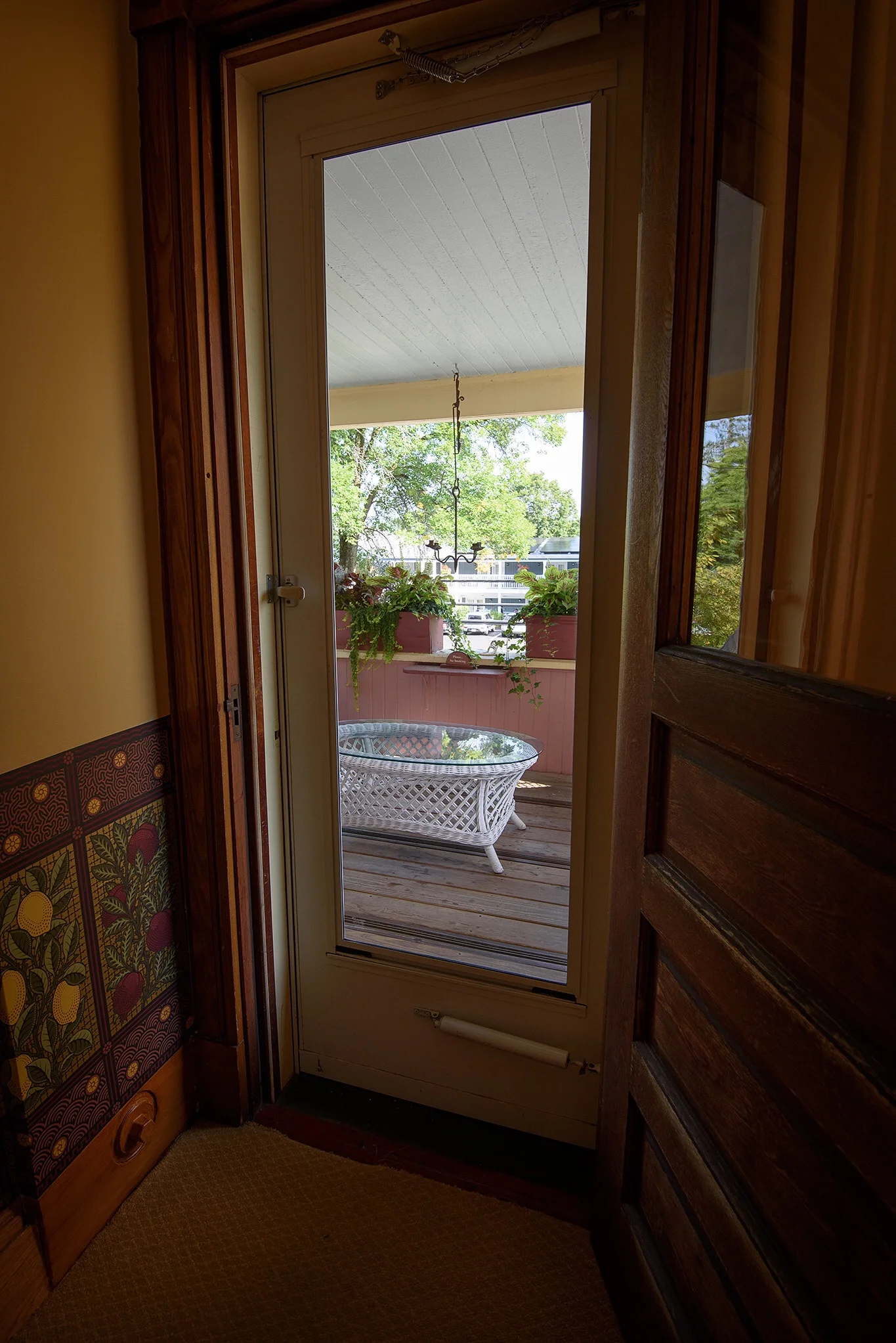 A quiet porch on the second floor of the Village Inn was the perfect place for a complimentary glass of wine at happy hour.