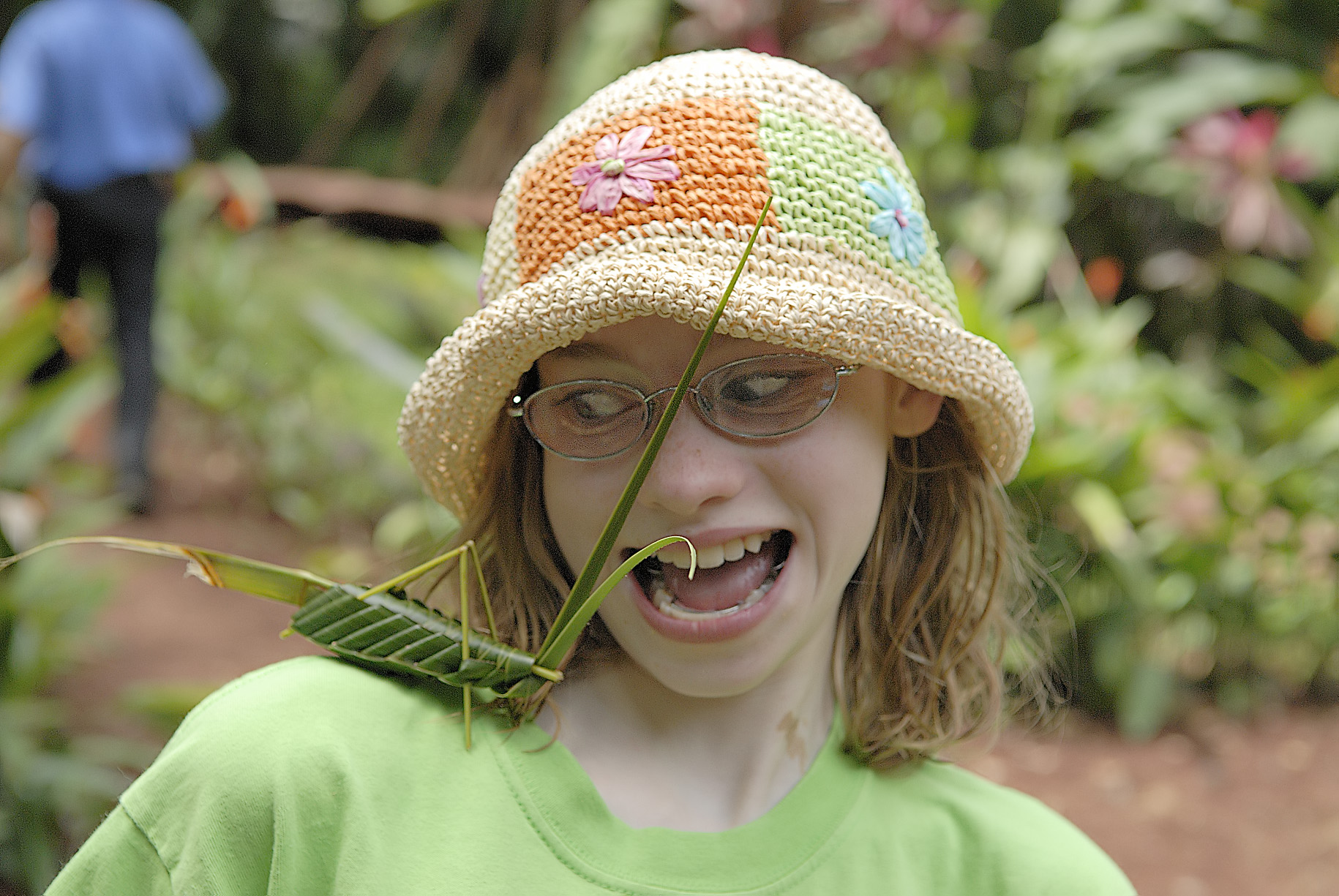 Our daughter is amateur actress and here she really sells her terror at this enormous grasshopper...made of grass by our guides in Costa Rica! 