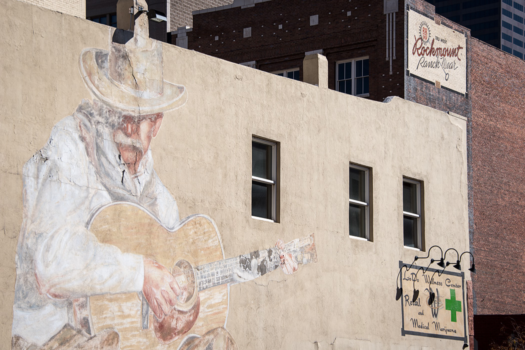 An example of old and "new" Denver...traditional ranch wear outfitter and seed store buildings house green cross wellness centers and internet businesses. 