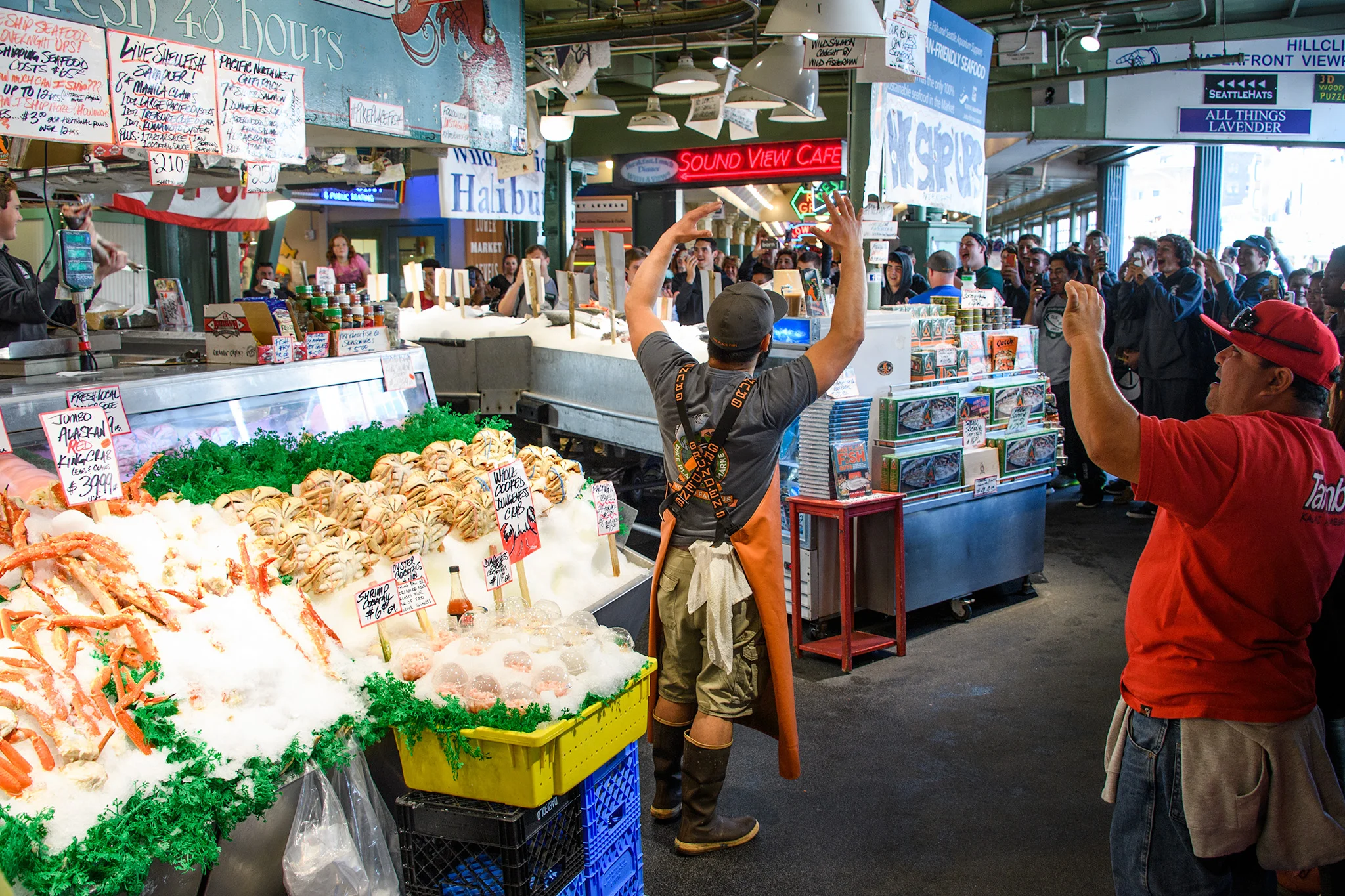The famous fish markets are part market, part tourist attraction...where the fishmongers toss fish and chant for phone wielding tourists, but on a busy Friday afternoon also wrapped lots of fish for local shoppers.