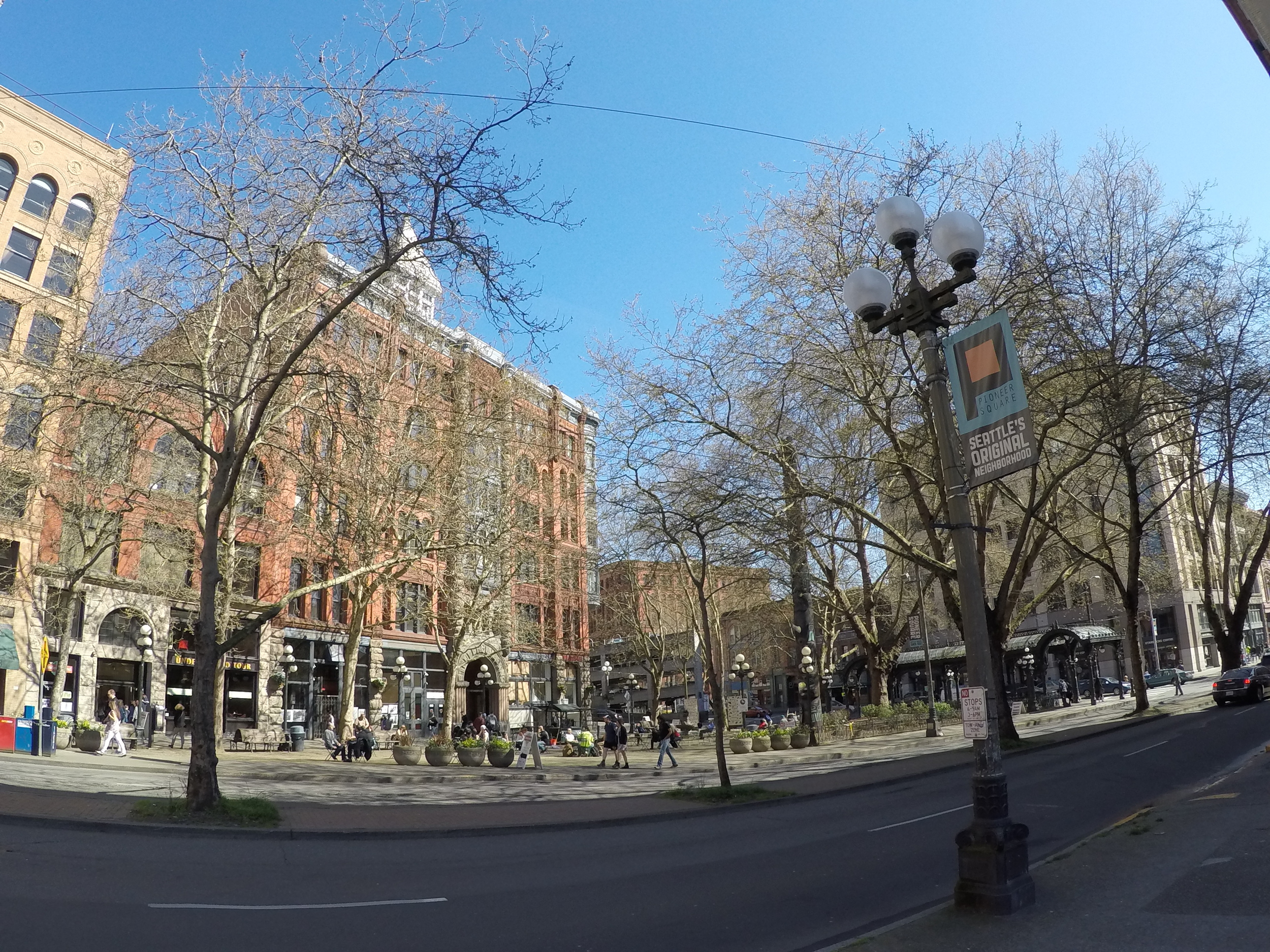 Underground Tours start in the center building of three on the left side of this photo taken on 1st Ave (the shorter one, behind the tree) 